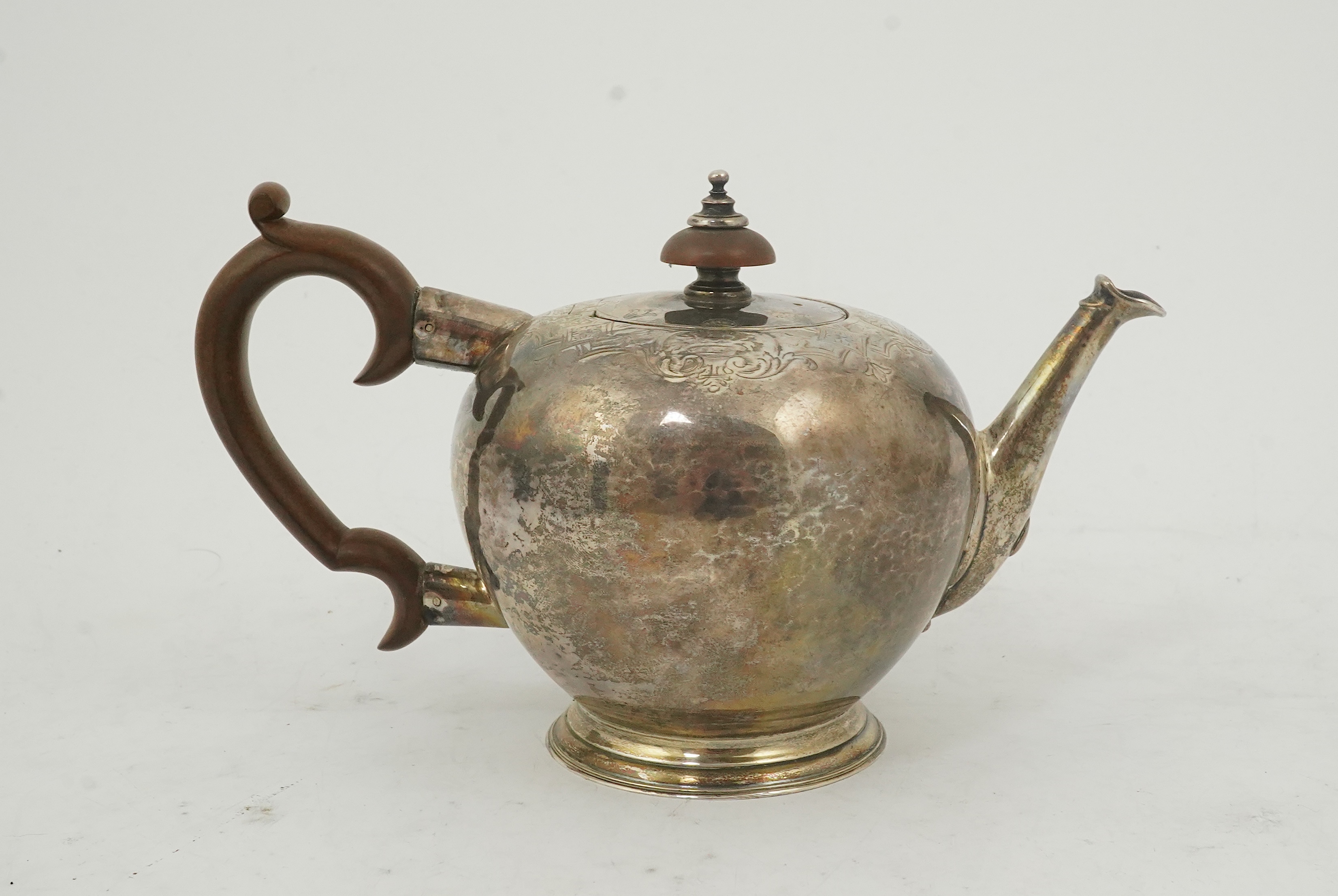 A George II silver bullet shaped teapot, by Thomas Farren